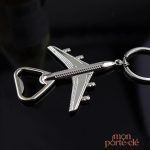 Porte-clé en forme d'avion, décapsuleur intégré