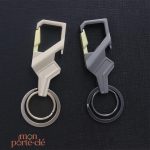 Porte-clé en acier avec fonction décapsuleur