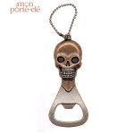 Porte-clé décapsuleur crâne ricanant en acier