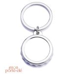 Porte-clé en forme de capsule avec fonction décapsuleur