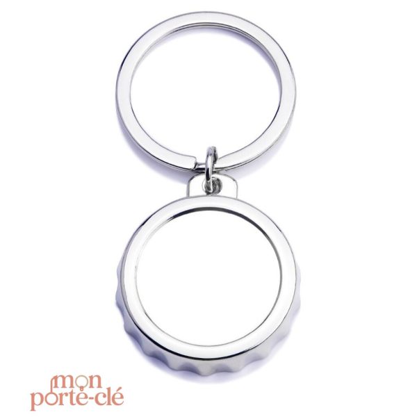 Porte-clé en forme de capsule avec fonction décapsuleur