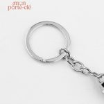 Accessoire fonctionnel - porte-clé décapsuleur acier design
