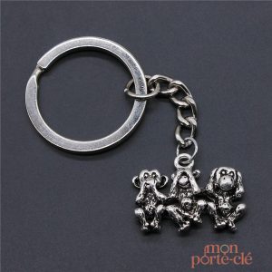 Porte-clé singe avec les trois singes de la sagesse