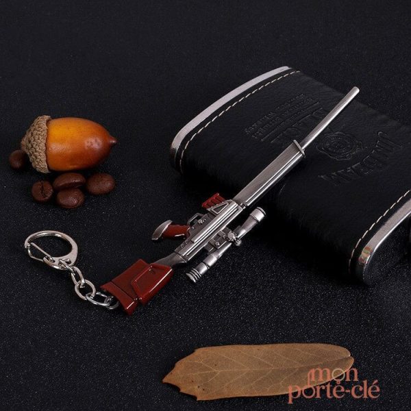 Porte-clé en métal avec effet d'arme
