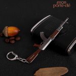 Porte-clé en forme d'arme pour collectionneur