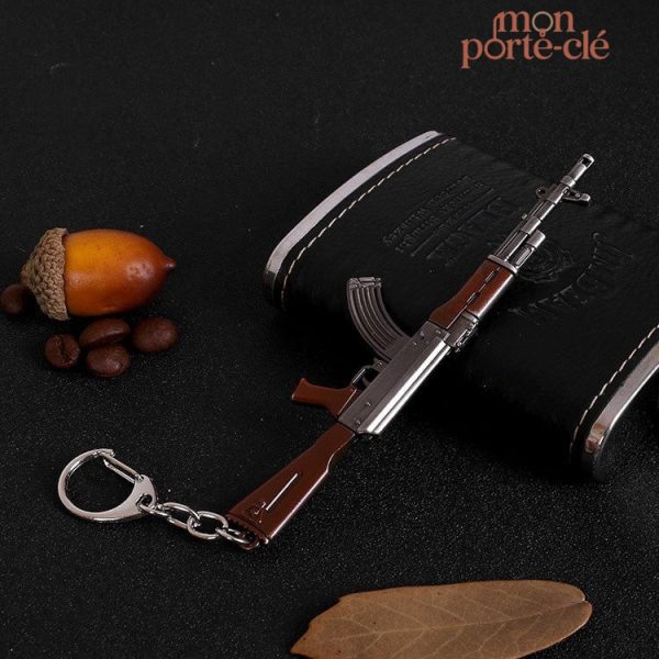 Porte-clé en forme d'arme pour collectionneur