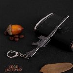 Porte-clé à accrocher, motif d'arme