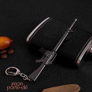 Porte-clé créatif représentant une arme