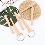 Porte-clé en forme de baguette pour musiciens