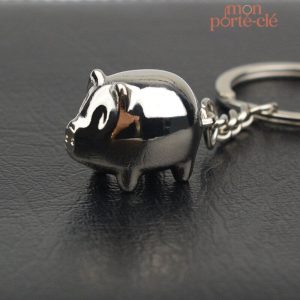 Porte-clé design cochon en métal brillant