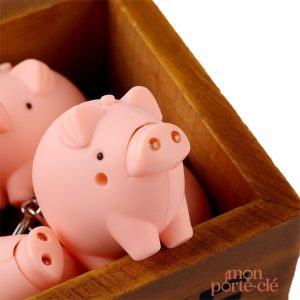 Porte-clé rose représentant un cochon