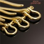 Accessoire porte-clé en laiton, design intemporel