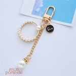 Porte-clé femme orné de détails scintillants