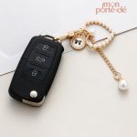 Porte-clé femme, pièce distinctive en métal