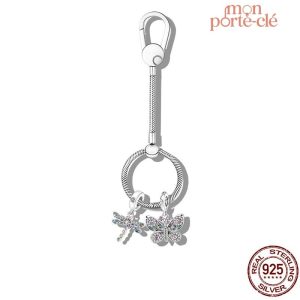 Porte-Clé Femme Chic avec pompon décoratif