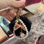 Porte-clé pompon coloré pour femme