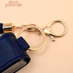 Porte-clé fonctionnel en cuir pour désinfection