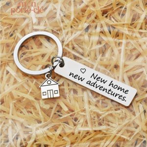 Porte-clé New Home, symbole d'un nouveau départ et d'une nouvelle aventure