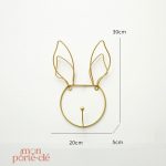 Porte-clé mural original avec design tête dorée