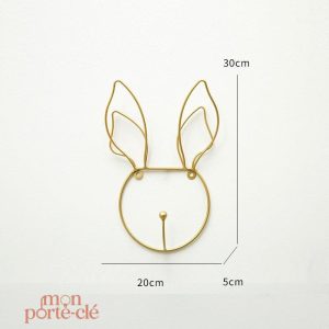 Porte-clé mural original avec design tête dorée