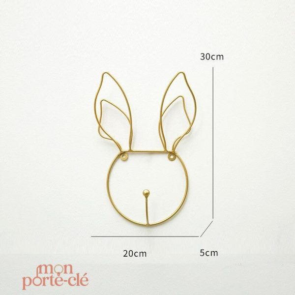 Porte-clé mural original avec design tête dorée