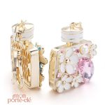Porte-clé créatif en forme de parfum