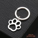 Porte-clé patte de chien en métal élégant
