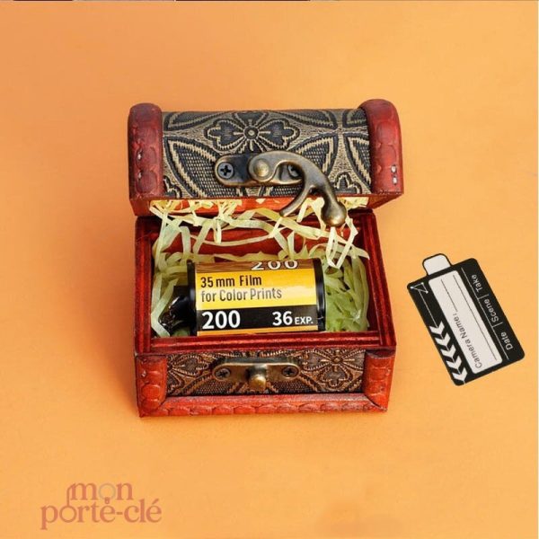 Porte-clé représentant une pellicule