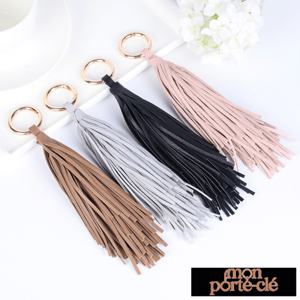 Porte-clé cuir avec pompon élégant