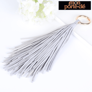 Porte-clé en cuir, style pompon tendance