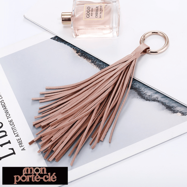 Porte-clé chic en cuir avec pompon décoratif