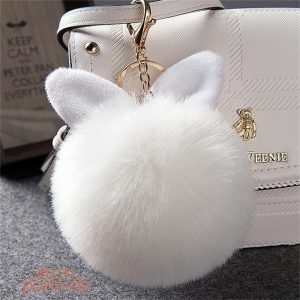 Porte-clé en forme de lapin avec pompon décoratif