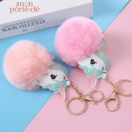 Porte-clé unique avec pompon et design licorne