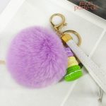 Porte-clé pompon mauve macarons élégant et tendance
