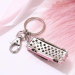 Porte-clé voiture avec motif floral rose