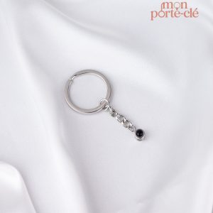 Porte-clé avec image projetée en lumière