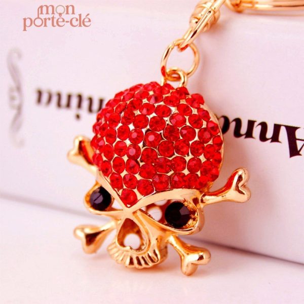 Porte-clé original avec strass en forme de tête de mort