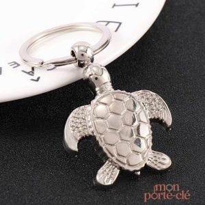 Accessoire porte-clé tortue en métal argenté