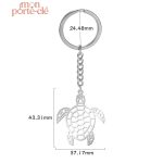 Porte-clé homme tortue, symbole de protection et longévité