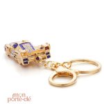 Porte-clé voiture design sportif et doré