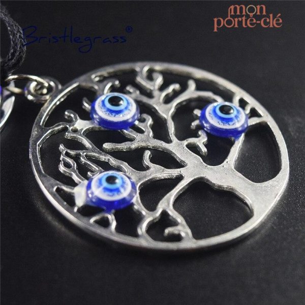 Accessoire en métal avec symbole Arbre de Vie et pierres bleues