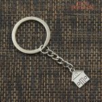 Porte-clé en forme de maison pour clé de foyer