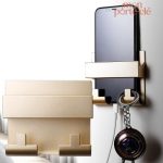 Porte-clé innovant avec support pour téléphone intégré